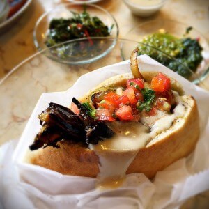 Sausage grill sandwich at Bar Ochel, Carmel Market, Tel Aviv.